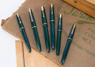 Lot 255 - Six  green Parker fountain pens
