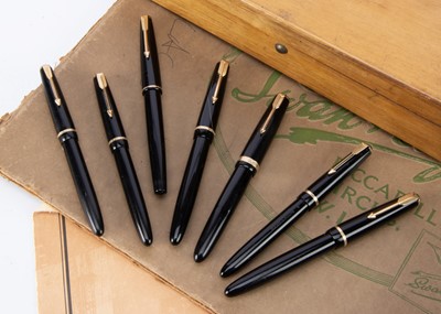 Lot 256 - Seven black Parker fountain pens