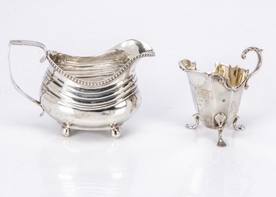 Lot 281 - Two 19th century silver milk jugs