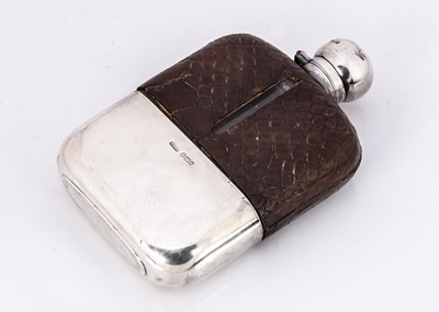 Lot 287 - An Edwardian glass and silver hipflask