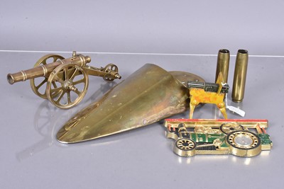 Lot 606 - An assortment of trench art and brass items