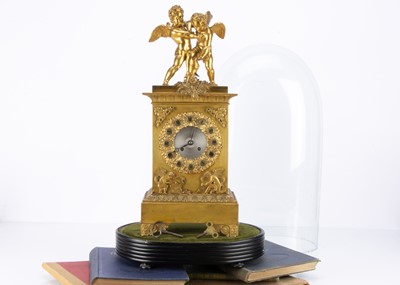 Lot 1 - A late 19th century gilt mantle clock
