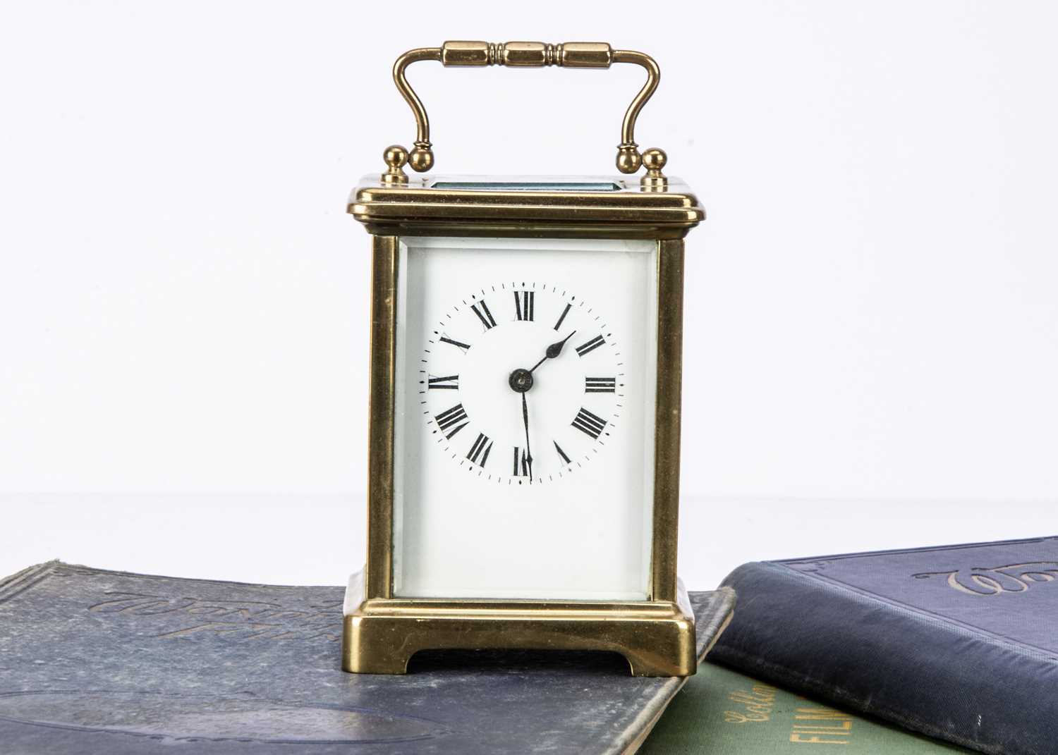 Lot 5 - A late Victorian brass carriage timepiece