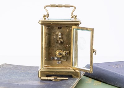 Lot 5 - A late Victorian brass carriage timepiece