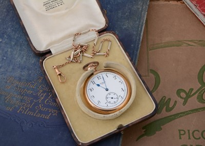 Lot 71 - An early 20th century gold plated Waltham pocket watch with gold chain in box