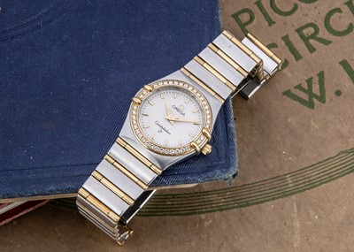 Lot 94 - A modern Omega Constellation quarts stainless steel and gold lady's wristwatch