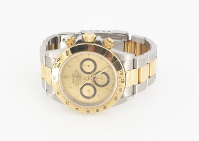 Lot 106 - A 1990s Rolex Oyster Perpetual Daytona stainless steel and 18ct gold wristwatch full set