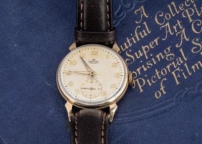 Lot 124 - A 1950s Smiths De Luxe manual wind 9ct gold cased wristwatch