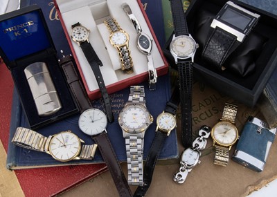 Lot 128 - A group of watches and cigarette lighters