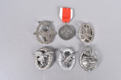 Lot 730 - A group of six reproduction German badges