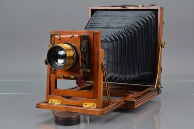 Lot 28 - A Mahogany and Brass Half Plate Camera