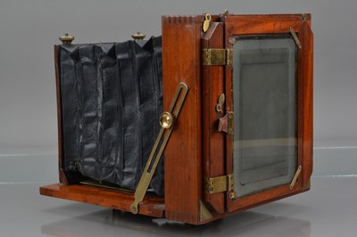 Lot 29 - An E & T Underwood Mahogany & Brass Half Plate Camera