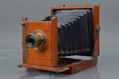 Lot 30 - A Mahogany and Brass Quarter Plate Camera