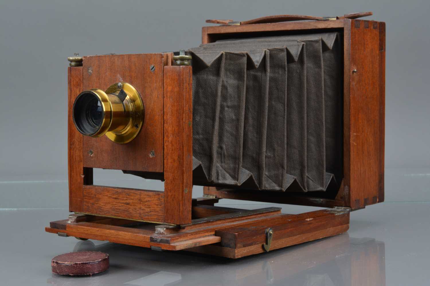 Lot 31 - A Mahogany and Brass Quarter Plate Camera