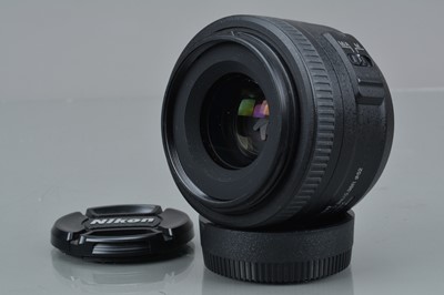 Lot 181 - A Nikon AF-S DX Nikkor 35mm f/1.8G Lens