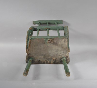 Lot 382 - A 19th century primitive elm stick back child's armchair
