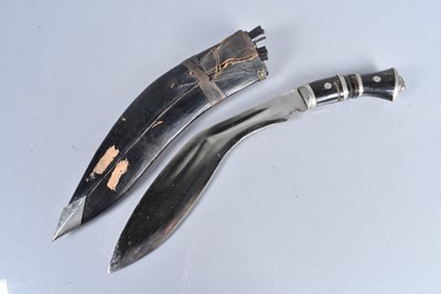 Lot 875 - A Middle Eastern Kukri knife