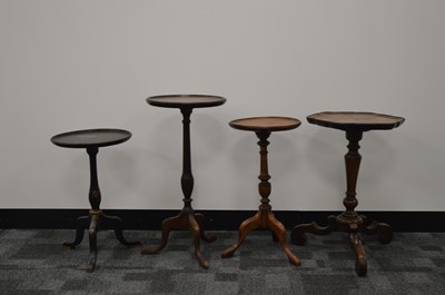 Lot 384 - Four 19th century tripod occasional/wine tables