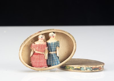 Lot 3 - Two miniature Grodnerthal dolls’ house dolls in an oval cardboard box