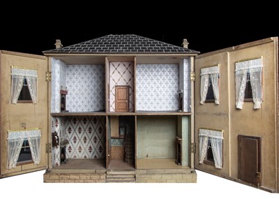 Lot 11 - A mid 19th century English Toyman’s wooden dolls’ house
