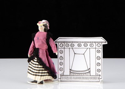 Lot 16 - A rare 19th century bisque shoulder head dolls’ house doll with moulded hat
