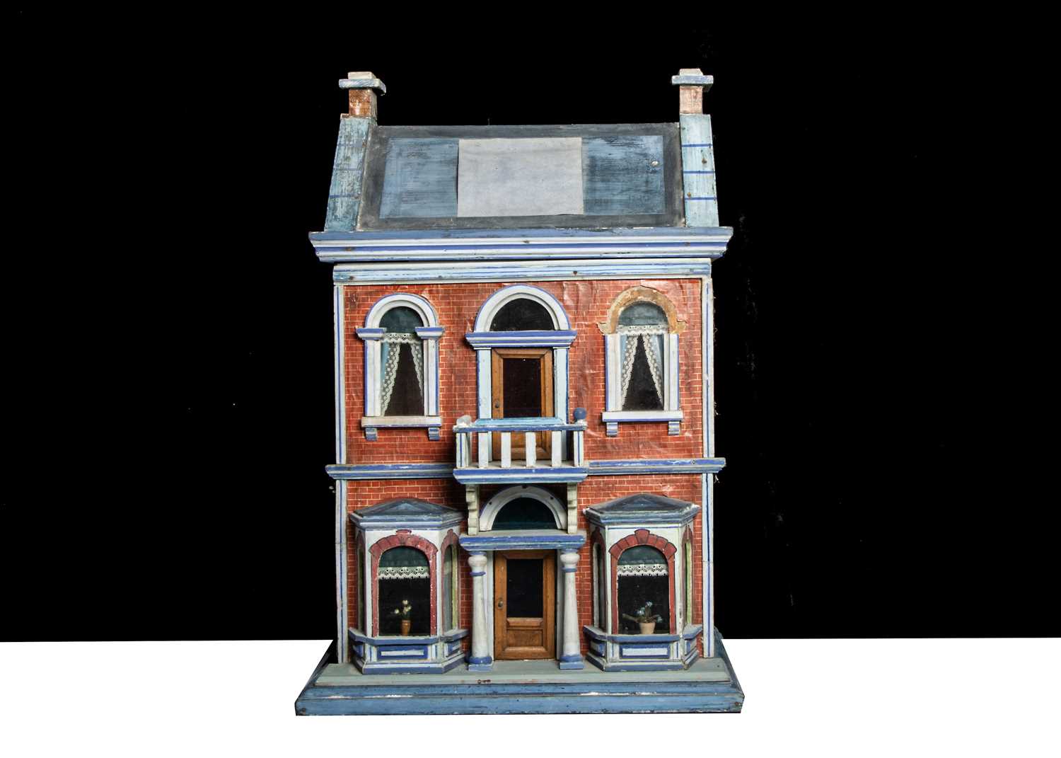 Lot 25 - A Gottschalk wooden blue roof dolls’ house