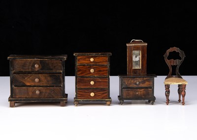 Lot 45 - Five pieces of German 19th century wood grained dolls’ house furniture