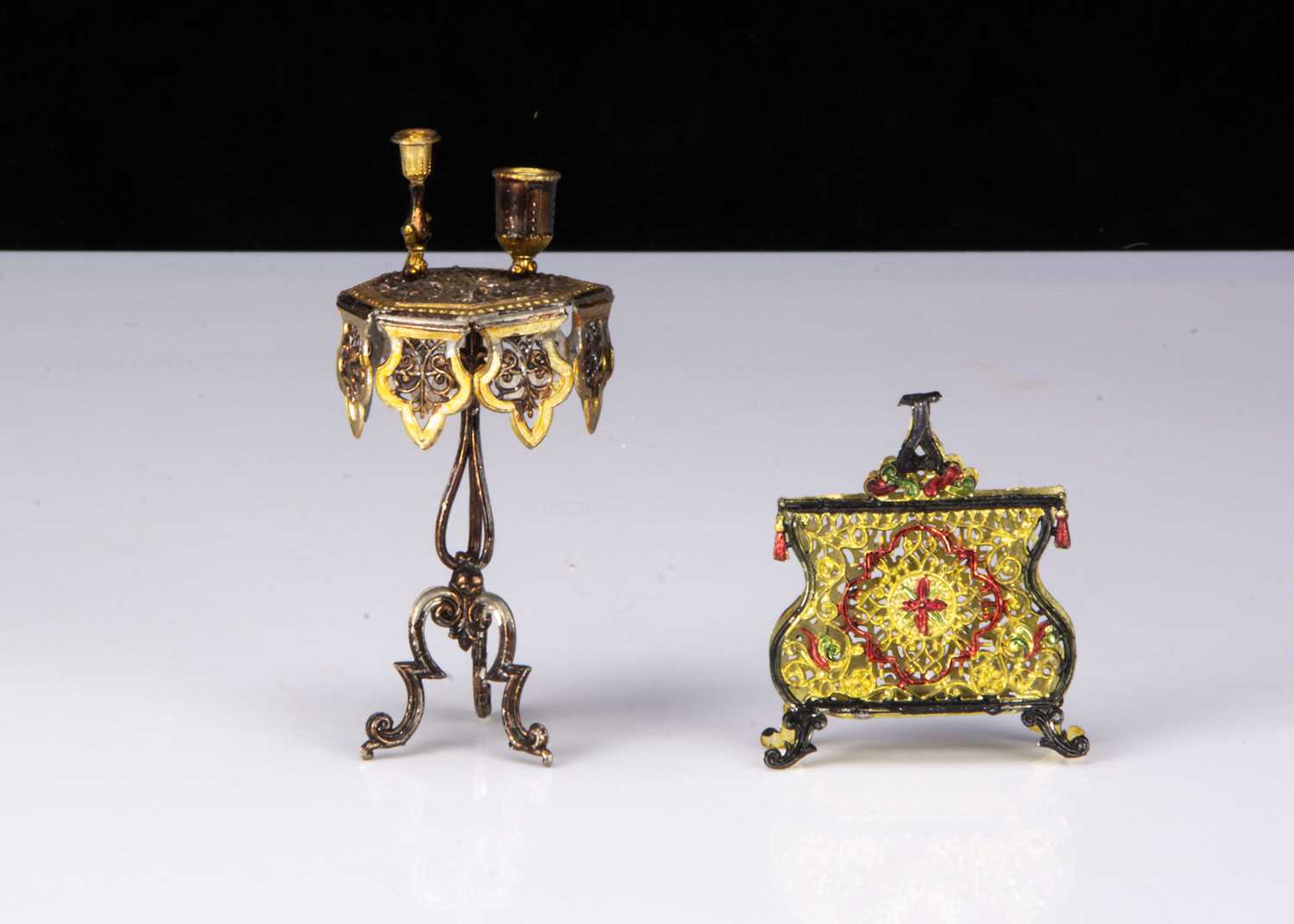 Lot 46 - A German bronzed soft metal dolls’ house smoking table