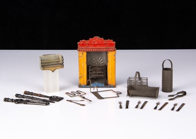 Lot 48 - An 19th century tinplate dolls’ house fireplace