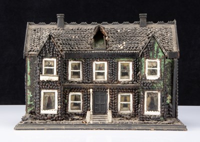 Lot 55 - An English or American late 19th century folk art shell house