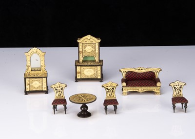 Lot 56 - A rare German chromolithograph paper on wood dolls’ house ivory and ebony saloon set