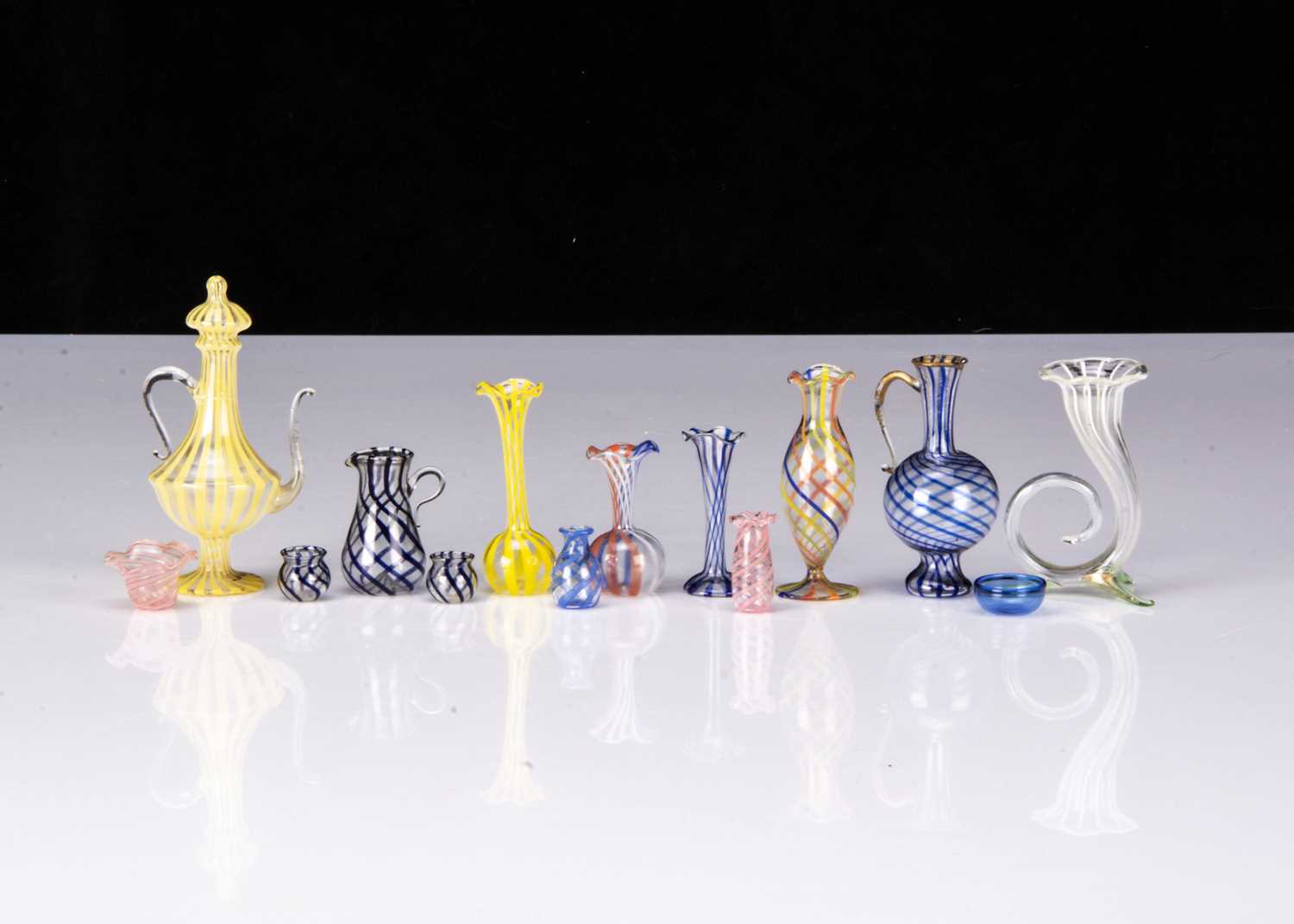 Lot 57 - Latticino glass dolls’ house vessels