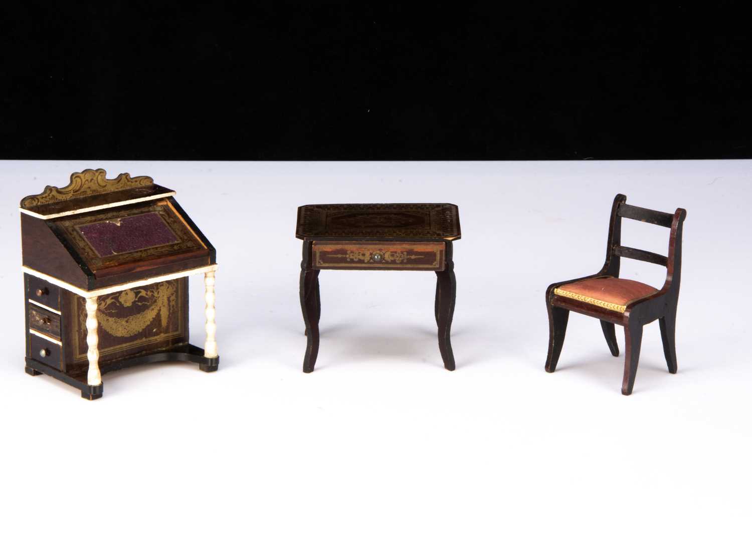 Lot 83 - Two Waltershausen-type gilt-transfer dolls’ house furniture