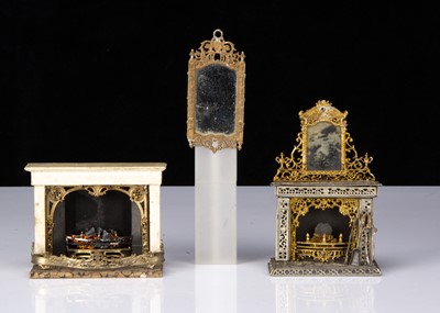 Lot 85 - Two German soft-metal dolls’ house fireplaces