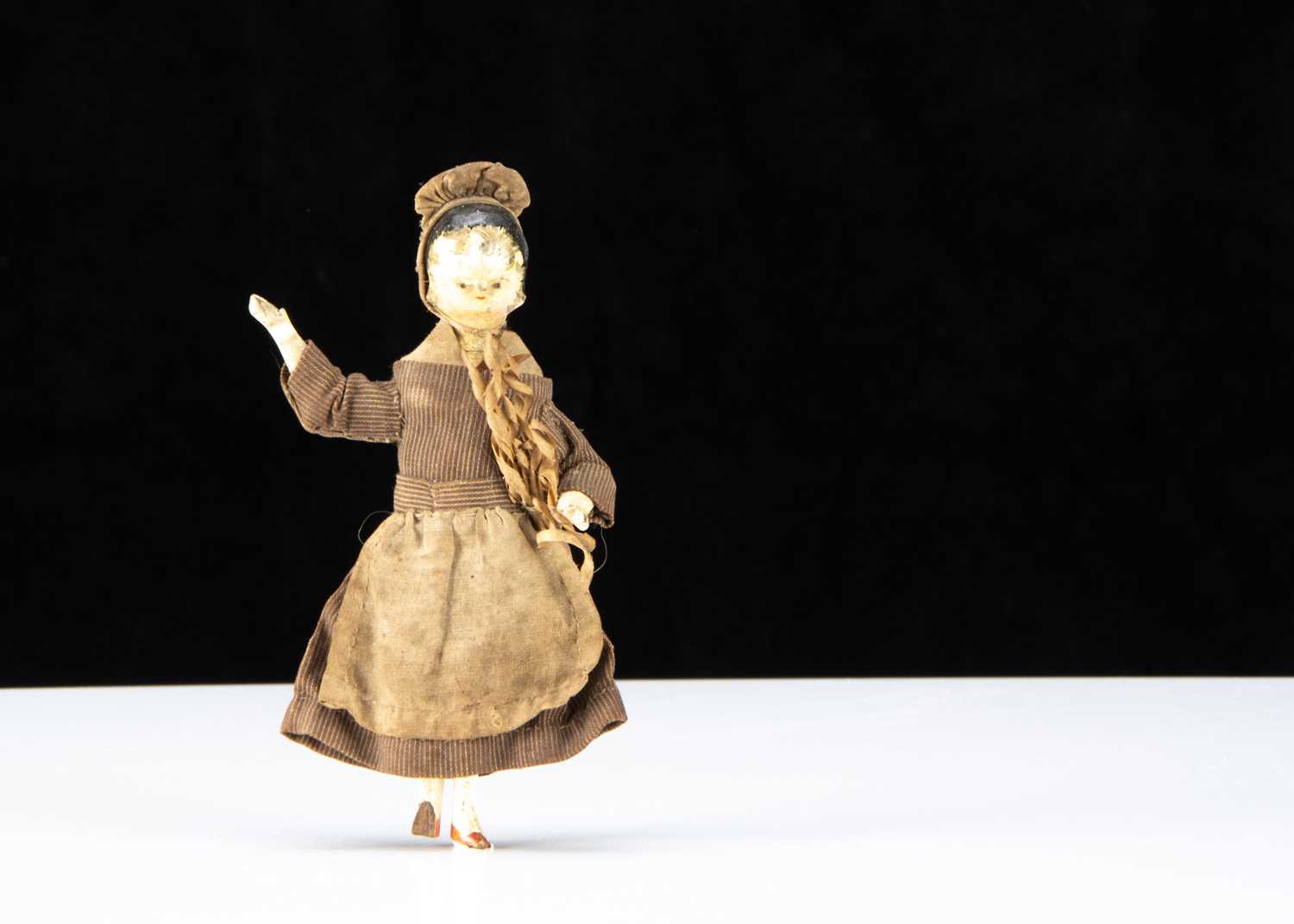 Lot 96 - A 19th century Grodnerthal dolls’ house cook doll