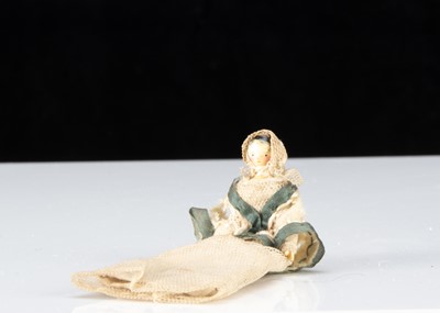 Lot 98 - A 19th century Grodnerthal dolls’ house baby doll