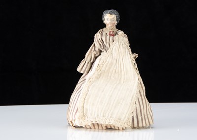 Lot 100 - A 19th century composition ‘alien’ headed dolls’ house nursery maid with Grodnerthal baby