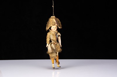 Lot 110 - A small mid 19th century German papier-mâché Polichinelle