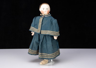 Lot 114 - An unusual 19th century china headed girl doll