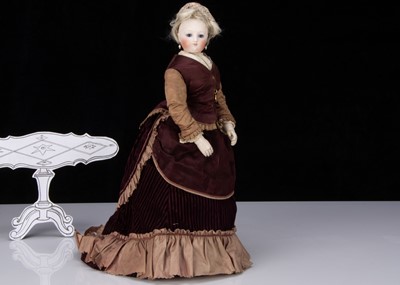 Lot 118 - A rare 19th century Simonne fashionable doll with jointed wooden labelled body