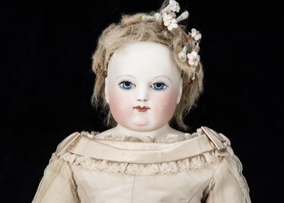 Lot 120 - A French fixed shoulder-head fashionable doll with painted eyes