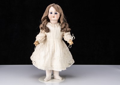 Lot 126 - A bisque headed child doll impressed 8