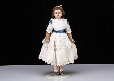 Lot 128 - A 19th century English poured wax child doll