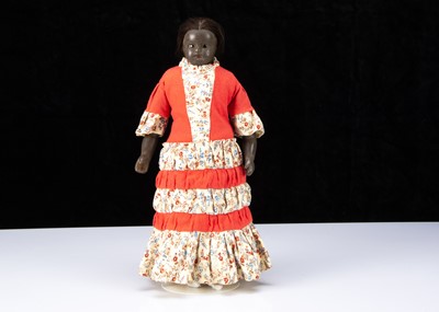 Lot 129 - A rare 19th century English black poured wax child doll