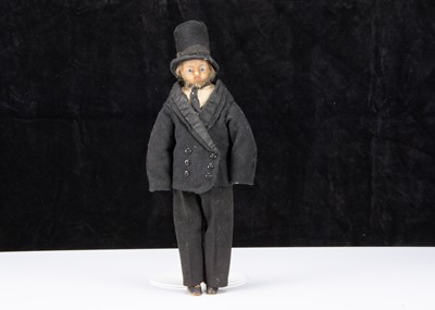 Lot 131 - A rare 19th century English poured wax gentleman doll