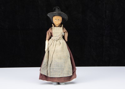 Lot 132 - A 19th century English wax over papier-mâché doll in Welsh traditional costume