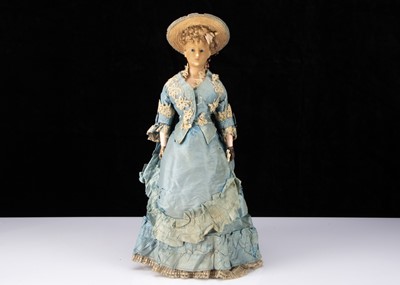 Lot 134 - A fine late 19th century German wax over composition fashionable lady doll