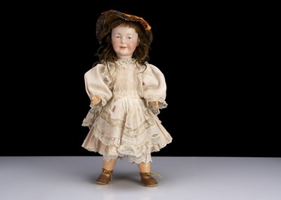Lot 141 - A rare Armand Marseille painted eye character girl doll circa 1910