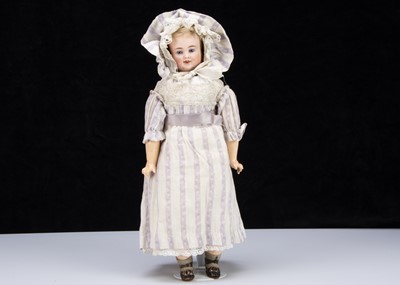 Lot 149 - A rare Bergner three faced bisque headed doll
