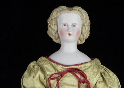 Lot 177 - A German bisque shoulder-head doll with elaborate hair